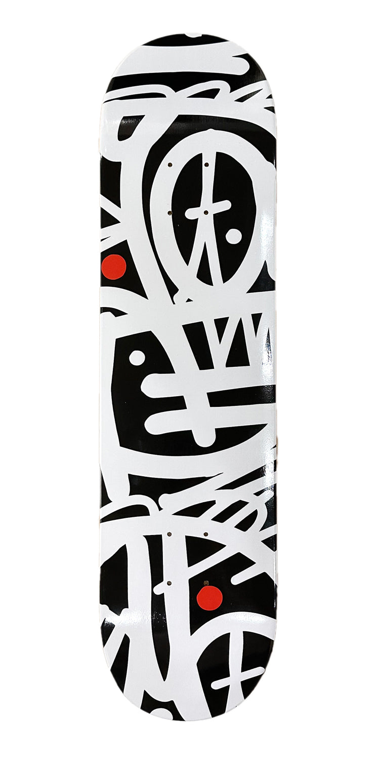 A black and white skateboard with red dots 